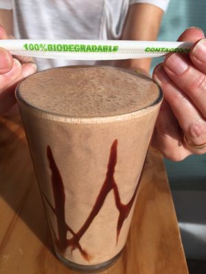 Yummy chocolate banana peanut butter smoothie (bonus for biodegradable Straw! at Cali Cafe in Cozumel