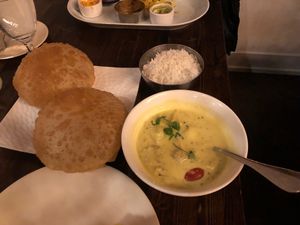 Poori bread with jackfruit and potato curry at Kathakali Indian Cuisine in Kirkland