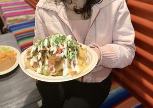 Best Nachos in Town! Got the Gluten Free Carnitas which had the best Consistency and their cheese just melts in your mouth!  at Doomie's NextMex - Vine in Hollywood