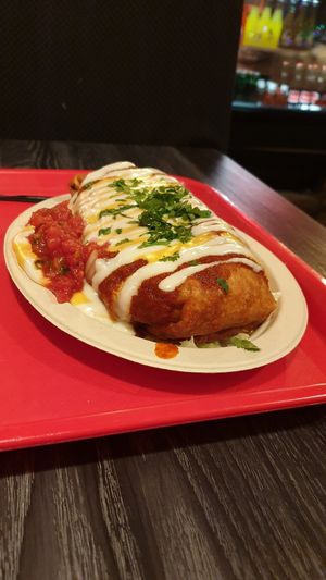 Al pastor wet style burrito at Doomie's NextMex - Vine in Hollywood