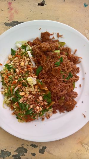 Pak choi salad with peanuts and Asian styled rice noodles with soy shreds. at Ahimsa Vegan Cafe in Mirissa