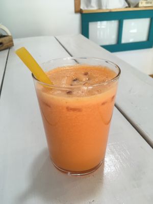 Carrot orange apple juice (the straw is a maccaroni)  at Happy Cactus in Fuerteventura
