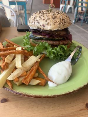 Vegan burger with rice-patty and grilled vegetables plus fries and vegan aioli (12€)  at Happy Cactus in Fuerteventura