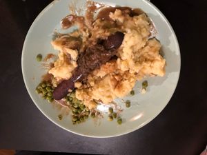 Bangers& Mash with peas (portion bigger-husband couldn’t wait!  Delicious! at Forky's - Veleslavinova in Prague