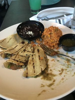 Vegetarian bean and cheese tacos grilled and served with black beans, rice, and green salsa. Delicious and so filling! My go-to.  at Cacao Restaurant in Kansas City