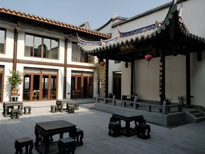 Outdoor seating area at Amitabha Zhen Su Guan - 阿弥陀佛珍素馆 in Fuzhou