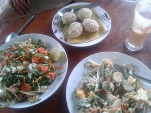 A creamy coconut salad, papaya salad and numnim pudding at Organic Vegetarian Food by Mrs. Pong in Koh Phangan