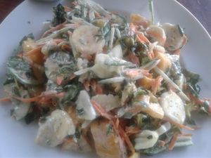 My favorite! A green salad with raw homemade coconut dressing. Ask for it raw. I added some organic mango as well. at Organic Vegetarian Food by Mrs. Pong in Koh Phangan