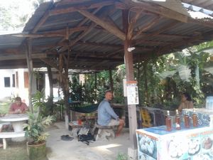 Outdoor sitting area  at Organic Vegetarian Food by Mrs. Pong in Koh Phangan