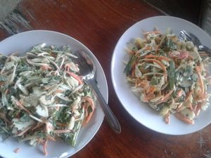 Green salad and mixed salad. Both raw and delicious with raw coconut dressing on top - ask for it raw if desired.  at Organic Vegetarian Food by Mrs. Pong in Koh Phangan