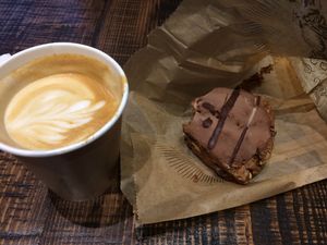 Coffee with almond milk and scone at Diva Espresso in Kenmore
