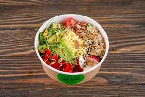 Bowl with quinoa, avocado, vegetables and vegan cheese (300) at Vegano Hooligano - Rishelyevskaya in Odessa