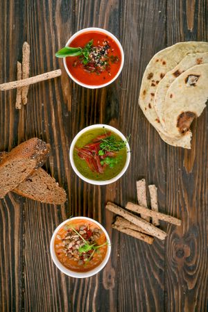 Lentil cream soup with spiced butter(300)

Tomato-basil cream soup with tofu and salsa (300)

Spinach cream soup with broccoli and green peas (300) at Vegano Hooligano - Rishelyevskaya in Odessa