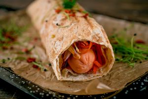 VEGAN-DOG with carrots, ginger, cheese, potatoes and BBQ sauce in thin pita bread (300)
 at Vegano Hooligano - Rishelyevskaya in Odessa
