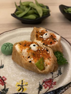 Spices inari I think! So delicious, we ordered more   at Sushi Kitchen in Petaling Jaya