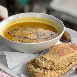 Pumpkin Curry with fresh home-baked bread at The Laughing Buddha Cafe in Pushkar