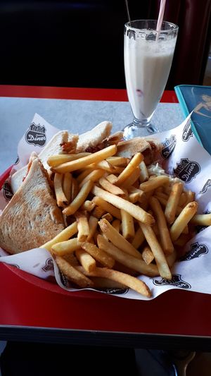 Huge portion of vegan sandwiches and fries at Classic American Diner in Rovaniemi