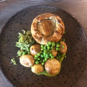 Brocolli & seitan pie, jersey royals and peas (main)   at The Cellar Door in Durham