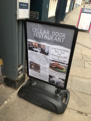 Board outside  at The Cellar Door in Durham