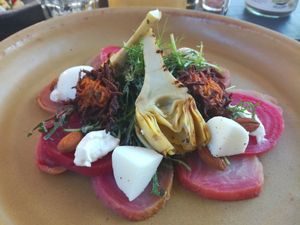 Smoked beetroot with vegan mozzarella, artichoke hearts and sweet potato fritters at Buitenplaats de Plantage in Vogelenzang
