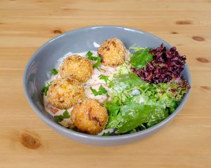 Arancini (vegan) in our special roasted peppers sauce at Mon Way Bistro & Cocktail Bar in East London