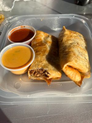 Vegan beef chimichanga with red and queso sauces at Nacho Taco in Jacksonville