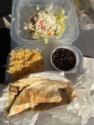 Vegan chicken supreme quesadilla with rice, black beans, and Mexican salad at Nacho Taco in Jacksonville