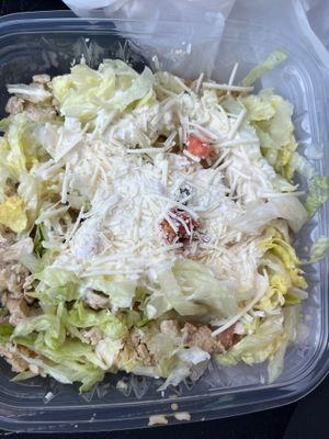 Rice bowl with vegan cheese and vegan chicken at Nacho Taco in Jacksonville