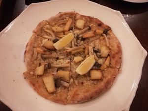 Potato and shimeji mushroom Pizza at Future Food Cafe Restaurant Tubu Tubu in Tokyo