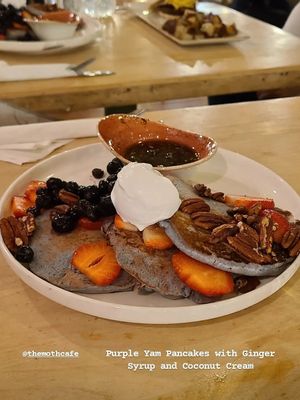 Purple Yam Pancakes with Ginger Syrup and Coconut Cream at The Moth Cafe - Downtown in Edmonton