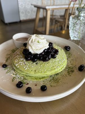Blueberry matcha pancakes with lavender syrupp  at The Moth Cafe - Downtown in Edmonton