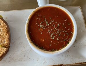 Fresh tomato soup (has tomato chunks but they are small)  at The Moth Cafe - Downtown in Edmonton