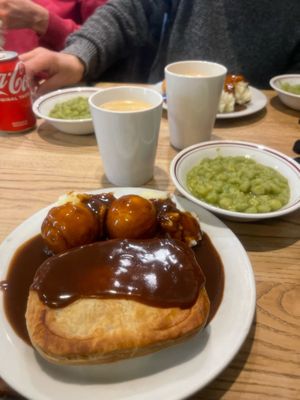 Pie, mash, and gravy with some mushy peas!  at Goddards at Greenwich in South East London