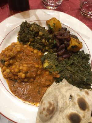 Selection of vegan vegetable dishes. And freshly baked chapati.  Rice is also available at Lassani in Courbevoie