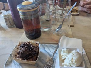 Vegan banana and chocolate cake served with vegan vanilla ice cream and fresh leaf early grey tea at Kibble Bakery in Skipton
