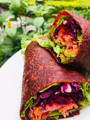 Colorful tomato wraps at La Bruja Vegan Foods in Antigua