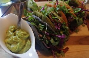 Tacos de seitan y hongos con tortillas de colores at La Bruja Vegan Foods in Antigua