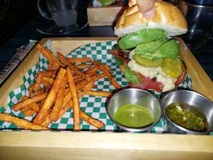 Mushroom burger, olive bread at La Bruja Vegan Foods in Antigua