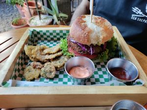 Delicious falafel burger with tostones at La Bruja Vegan Foods in Antigua