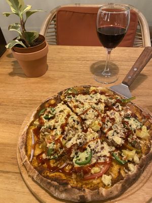 Make your own pizza  at La Bruja Vegan Foods in Antigua