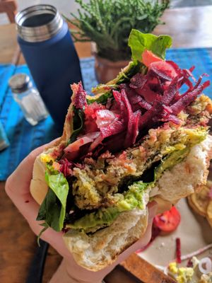 Lentil Burger - Avocado, Beets, Onions, Spinach, Mustard = Perfection.  at La Bruja Vegan Foods in Antigua
