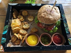 Huge lentil burger at La Bruja Vegan Foods in Antigua