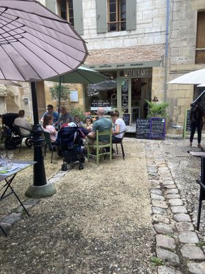 Dining on the terrace at Une Cuillère Pour Maman in Bergerac