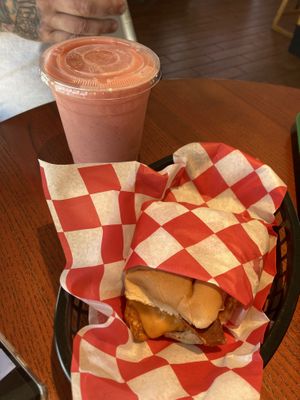 Egg chees sausage break sandwich n rare redu smoothy   at Santana's Vegan Grill in Colorado Springs