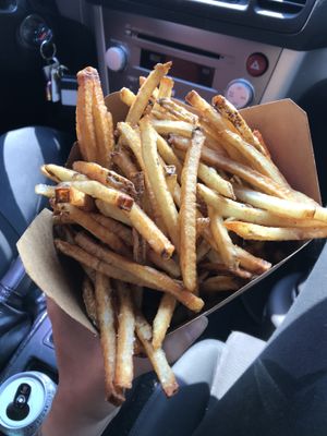 Delicious fries! The box is overloaded. at Santana's Vegan Grill in Colorado Springs
