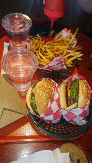 Deluxe bbq burger, and deluxe bacon cheese burger at Santana's Vegan Grill in Colorado Springs