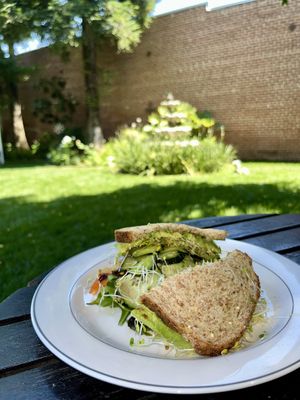 Eat in the peaceful garden behind Watson’s! Vegetarian sandwich on multigrain bread  at Watson's Veggie Garden in Visalia