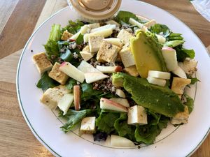 Seasonal salad: spring greens, arugula, apple, pecans, avocado, plus tofu & quinoa instead of chicken & feta  at Watson's Veggie Garden in Visalia