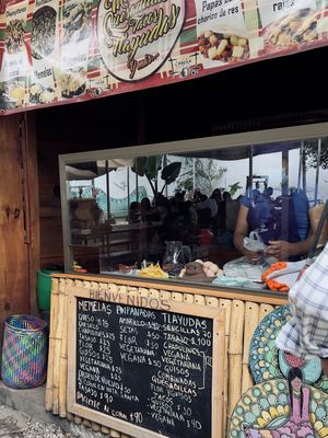 Labeled vegan memelas, tlayudas, tacos, empanadas  at Mercado Organico La Cosecha in Oaxaca