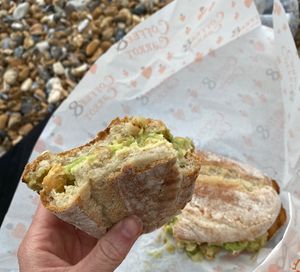 chickpea, hummus, and avocado ciabatta  at Coffee & Carrot in Eastbourne